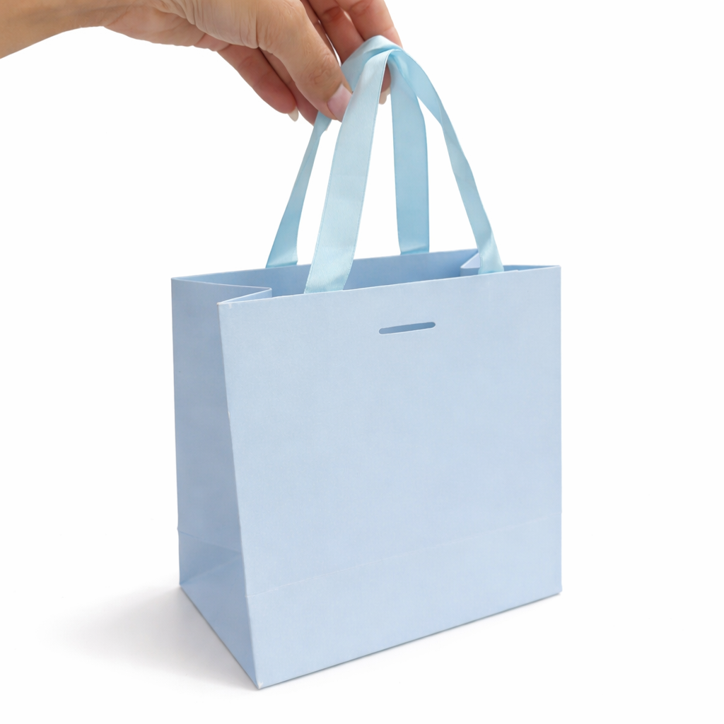 Bolsa Mini 14.5x8x14.5cm Celeste con Manija Cinta