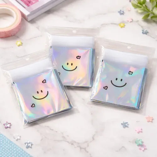 Bolsita Holografico (7x7+3) contiene 100 und.