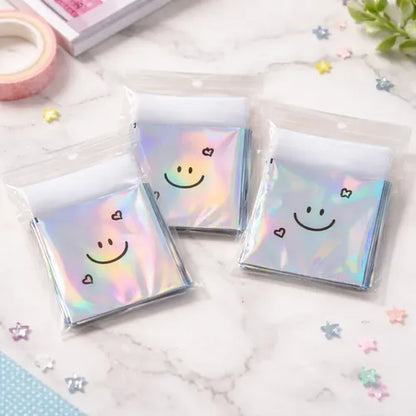 Bolsita Holografico (7x7+3) contiene 100 und.