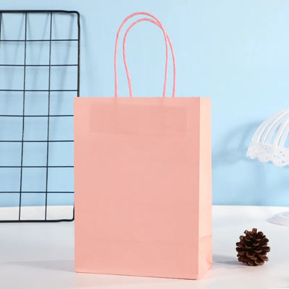 Bolsa en Papel Kraft Rosa - 15x8x21 cm