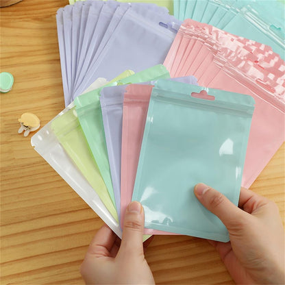 DOYPACK PASTELES 15X18CM (CONT. 50 UND)