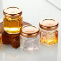 FRASCO VIDRIO HEXAGONAL TAPA DORADA 45ML