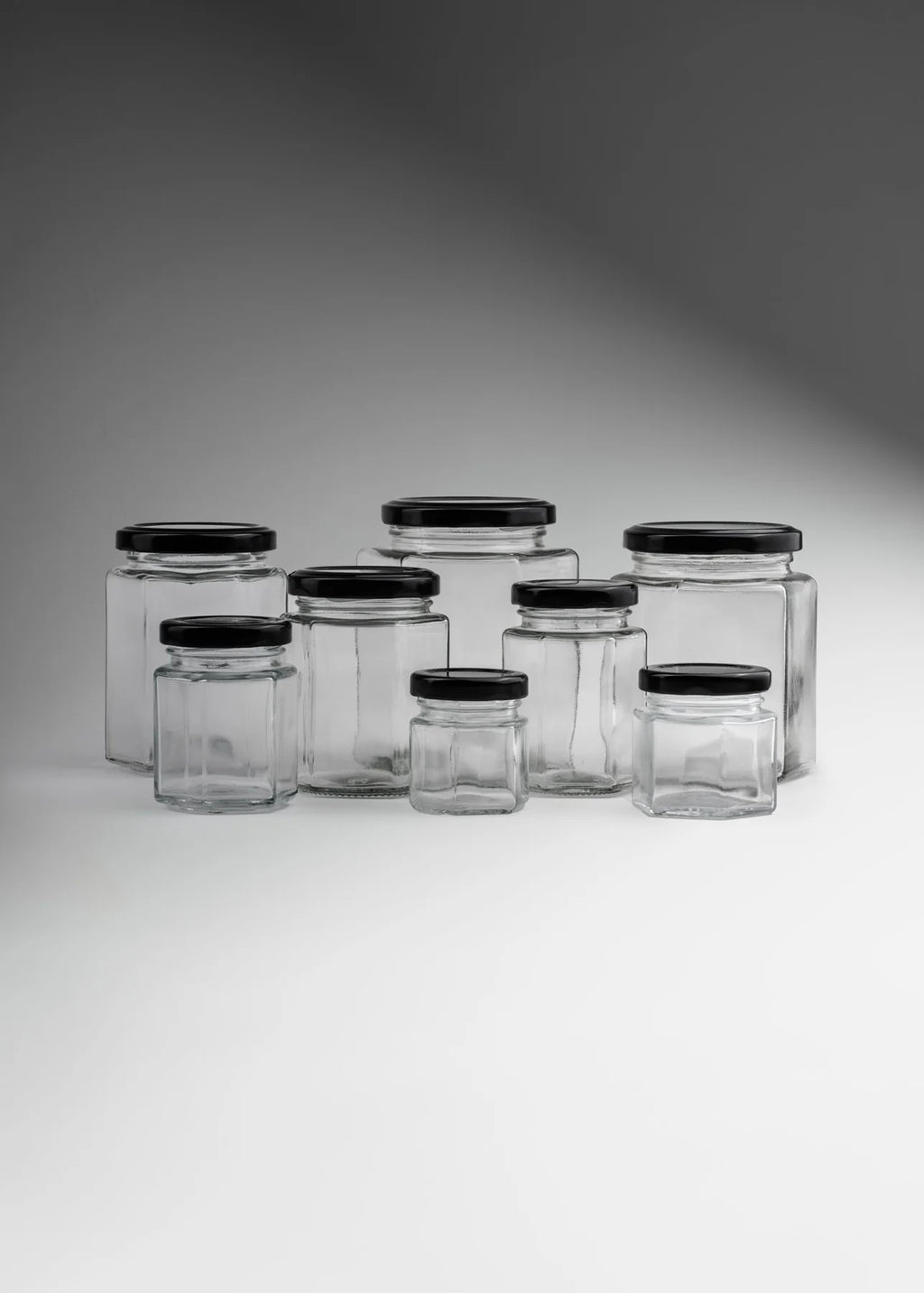 FRASCO VIDRIO HEXAGONAL TAPA NEGRA 280ml - 642609