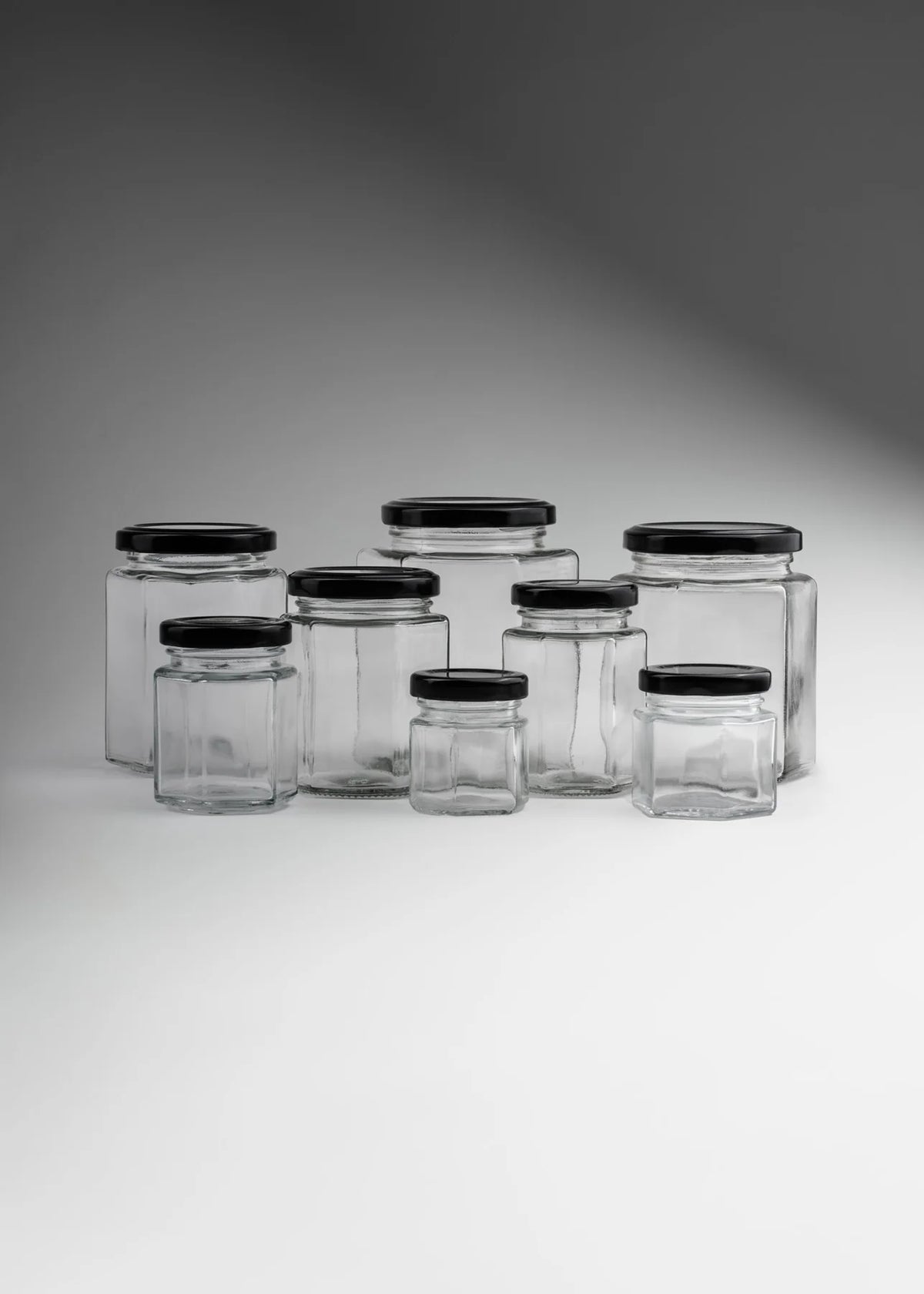 FRASCO VIDRIO HEXAGONAL TAPA NEGRA 280ml - 642609
